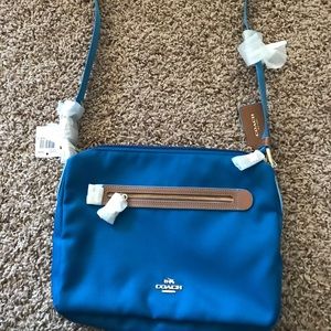 Coach blue nylon crossover handbag